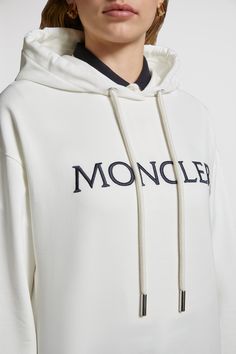 A Moncler classic, this hoodie is embellished with an embroidered logo across the chest. The loose fit sweatshirt is crafted from lightweight jersey and fleece. Luxury Long Sleeve Hoodie With Logo Print, Luxury Long Sleeve Hoodie With Ribbed Cuffs, Luxury Cotton Hoodie Sweatshirt, Luxury Cotton Sweatshirt With Logo, Luxury Cotton Sweatshirt With Embroidered Logo, Luxury Cotton Hoodie With Ribbed Cuffs, Luxury Long Sleeve Hoodie With Double-lined Hood, Luxury Sweatshirt With Drawstring Hood, Luxury Logo Long Sleeve Sweatshirt