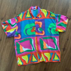 This Gender-Neutral Adult Oxfords item is sold by SaffronShakeLLC. Ships from Venice, CA. Listed on Feb 19, 2024 Skate Punk, Memphis Milano, Play Button, Color Play, Art Color, Punk Style, Nice Shorts, Punk Fashion, Button Up Shirt