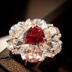 #tbt Fancy Red heart-shaped diamond ring by Moussaieff, the red diamond weighing 2.09 carats. Red Diamond Ring, Heart Shaped Diamond Ring, Red Stones, High Jewellery, Ring Settings, 25 November, Jewels Rings, Red Diamond, Heart Shaped Diamond