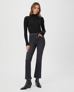 This black long sleeve high neck top is made from an incredibly soft and comfortable ribbed knit material with a flattering stitch detail at the waistline. Pair the Raisa Top with any shade of denim in your closet. Black High Neck Outfit, Sleek Turtleneck For Fall, High Neck Outfit, Petite Flare Jeans, High Neck Long Sleeve Top, Black Lotus, Breaking In, Cropped Flare Jeans, High Neck Top