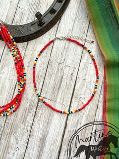 Red Serape Chocker Necklace Made with size 8/0 seed beads.  SIZE GUIDE  Ʊ  The Necklace is adjustable has a chain and pendant lobster clasp on the ends, which can easily adjust its length to fit your size. It closes to a minimum of 13" to a maximum of 16". Ʊ If your neck size is larger or smaller than the measurements above please leave a note at checkout of your neck size and I will be happy to customize the size for you. Ʊ How to measure your neck size: If you don't have a seamstress tape measure, take a piece of yarn or string and wrap it around your neck to a comfortable fit marking the point where the end touches itself. Lay the string straight next to a ruler and note the length. Ʊ  In the drop-down menu there is the option to buy the set of 2, 3 and 4 the same with a discount All Pr Hippie Tiny Beads For Festival, Colorful Heishi Beads For Festival, Southwestern Style Large Beads For Beach, Southwestern Style Large Beads, Southwestern Style Large Beach Beads, Handmade Red Hippie Beaded Bracelets, Festival Heishi Beads Necklace With Tiny Beads, Red Hippie Beaded Bracelets For Gift, Hippie Red Beaded Bracelet Gift