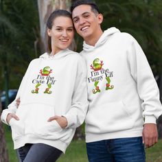 Make the holidays extra special for your family with matching Christmas outfits! Shop our selection of elf hoodies, sweatshirts and shirts for couples and families. Matching sets include his and hers designs, funny sayings and more. Choose from a variety of colors and styles to create the perfect matching outfit for your special occasion. Find the perfect matching shirts, hoodies, sweatshirts and sets for your family today! Funny White Winter T-shirt, Funny White T-shirt For Winter, Winter Funny Style Top With Text, Funny Winter Top With Text, Winter Funny Text Top, Winter Tops With Funny Print, Matching Family Christmas Outfits, Shirts For Couples, Beer Hoodie