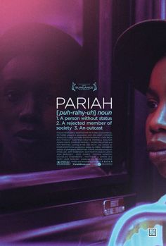 a man looking at his reflection in a mirror with the words pariah on it