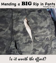 a piece of paper sticking out of the pocket of a pair of camouflaged pants