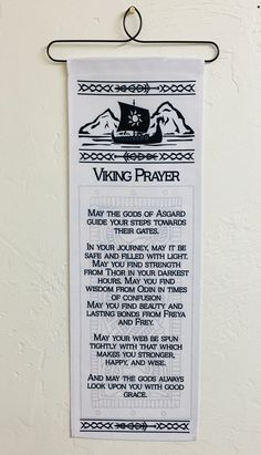 a viking prayer is hanging on the wall