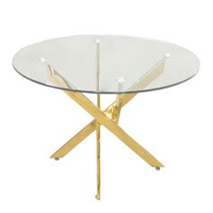 a round glass table with gold legs