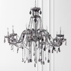 a crystal chandelier hanging from the ceiling