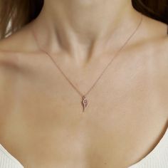 The symbolic Wing Charm Necklace is the ideal present for a loved one or for yourself. You will be charmed by this necklace and it will be a wonderful addition to your collection of designer accessories. Metal: 925 sterling silver Coating: 18k gold Pendant: 3.2 x 1.0 cm (1.25" x 0.4") Stones: cubic zirconia Chain style: cable link Chain length: 40 cm + 5 cm extender (16" + 2") Hypoallergenic: nickel-free materials used therefore suitable for those with metal allergies Rose Gold Charm Necklace As Gift For Mom, Rose Gold Charm Necklace With Heart Pendant, Rose Gold Heart Pendant Charm Necklace With Delicate Chain, Rose Gold Charm Necklace For Mom, Rose Gold Pendant Charm Necklace In Fine Jewelry Style, Rose Gold Pendant Charm Necklace, Mother's Day Rose Gold Charm Necklace Pendant, Rose Gold Charm Necklaces For Anniversary, Rose Gold Initial Pendant Charm Necklace With Delicate Chain