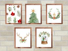 four framed christmas cards on a brick wall, each with a holiday tree and other decorations