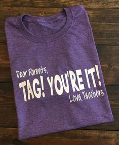 a purple t - shirt that says dear parents tag you're it love teachers