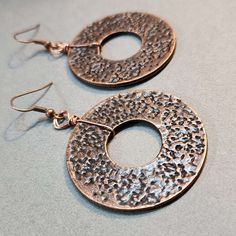 Large Copper Earrings, 40mm Hammered Circle Hoops, Handmade Dangle Earrings, 1.6 inch circles Statement Jewelry Large copper circle earrings with accent beads.  These earrings are a little bit heavy. Large, flat copper tone circle charms, antiqued hammered style finish.. Copper tone brass french ear wires (nickel-free). SIZE Circle diameter: 1.55 inches (40mm). For reference, a U.S. quarter is 24mm (see photos) Total earring length including the ear wire is 2.5 inches. You will look SO AMAZING w Handmade Copper Circle Jewelry, Handmade Copper Circle Earrings, Brown Copper Round Jewelry, Bronze Copper Earrings With Round Beads, Artisan Copper Hoop Earrings, Pierced, Handmade Dangle Earrings, Earrings Handmade Dangle, Copper Earrings, Circle Earrings