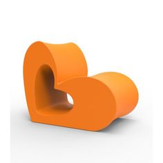 an orange heart shaped object on a white background