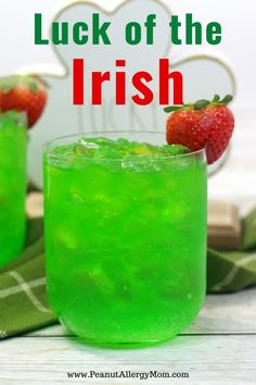 two glasses filled with green liquid and strawberries on the side, text overlay reads luck of the irish