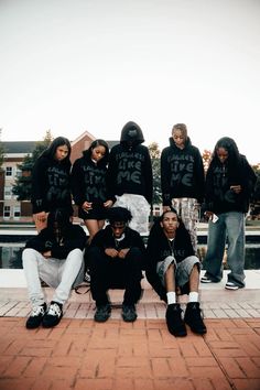 a group of young people posing for a photo