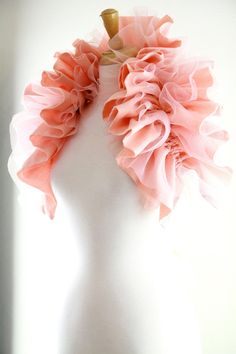 Cozy-up in an eye-catching statement collar, featuring gorgeous 'n soft cotton gauze fabric, levitated between 2 layers of ethereal peach glitter tulle!!  Enchanting on a summer evening over bare shoulders ...or perfectly festive by the fire in the colder months.  Double satin drawstring ties make it easy for you to create your own look with it on a whim... Wear it 4 different ways: *Tie in front, and wear long & loose as an infinity scarf. *Gather up ruffles and tie behind the back for a shrug. Luxury Organza Shawl For Women, Voile Unique, Tulle Scarf, Tulle Collar, Shoulder Shrug, Spring Pink Ruffled Tulle Fabric, June Bride, Statement Collar, Cotton Gauze Fabric