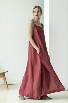 This maxi red dress is cut from airy natural linen that has an elegant design so is perfect for summer evening gatherings or walks on the beach. The dress features loose silhouette, square neck and asymmetrical side slits for extra feminine feel. Tie it with a belt to define frame.Complement the dress with heels and style with a basket bag.  #sustainablefashion #naturalmaterials #linendress #reddress #maxidress #dresswithpockets Linen Square Neck Sundress, Linen Dresses With Spaghetti Straps And Pockets, Linen Dresses With Pockets And Spaghetti Straps, Square Neck Linen Dress With Adjustable Straps, Linen Square Neck Dress With Adjustable Straps, Linen Maxi Dress With Straight Neckline, Linen Dress With Adjustable Straps And Square Neck, Linen Maxi Dress With Pockets, Linen Dress With Adjustable Straps And Straight Neckline