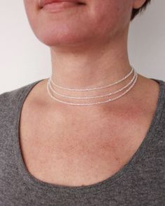 Layered choker necklace clear seed beads Silver Pearl Beaded Necklaces With Tiny Beads, Silver Pearl Beaded Necklace With Tiny Beads, White Tiny Beads Choker, White Beaded Chain Choker Jewelry, Delicate Pearl Beaded Choker, White Beaded Chain Dainty Choker, White Dainty Beaded Chain Choker, White Crystal Necklaces With Tiny Beads, White Beaded Crystal Choker Necklace