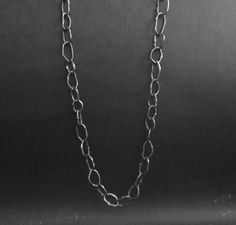 This chain is made entirely by hand. Suitable for different ways of wearing. With a rough look and style. It can be worn by both men and women which makes it great. Material: Silver, Oxidized patina Please, avoid dropping jewelry! S H I P P I N G : All objects are carefully wrapped in a bubble wrap and a box or input in elegant jewelry boxes and orders are shipped via registered priority international mail. Please, keep the jewelry away from perfume and other alcohol containing fluids because th Everyday Handmade Chain Link Necklace, Handmade Minimalist Link Chain Necklace, Oxidized Sterling Silver Chain Link Necklace, Sterling Silver Oxidized Chain Link Necklace, Minimalist Handmade Link Chain Necklace, Oxidized Silver Bracelet, Oxidized Silver Necklace, Rustic Bracelet, Handmade Chain