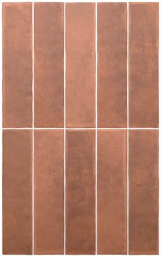 a brown tile wall with different sized tiles on it