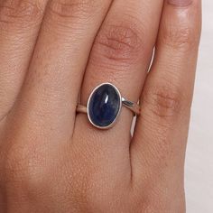 Kyanite Ring, 925 Sterling Silver Ring, Oval Gemstone Ring, Handmade Ring, Bohemian Ring, September Birthstone Ring, Birthday Gift for Her Gemstone Name - Kyanite  Stone Quality - AAA  Ring Length - 1.5 cm Ring Width - 1 cm Weight - 3.73 gm  Stone Shape - As shown in the picture Ring Size - All Ring Size Available  We serve complete 925 sterling silver Jewelry and genuine properties of the stone.  The products are dispatched from the small business from UK. Product Quality and Packaging - Our al Adjustable Oval Gemstone Stackable Rings, Oval Cabochon Sapphire Promise Ring, Sapphire Cabochon Rings For Gifts, Everyday Oval Gemstone Stackable Rings, Everyday Oval Sterling Silver Rings, Oval Sapphire Ring In Sterling Silver, Adjustable Oval Sapphire Ring In Sterling Silver, Oval Natural Stone Rings For Anniversary, Oval Rings With Natural Stones For Anniversary