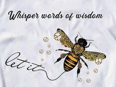 a t - shirt with a bee on it that says, whisper words of wisdom