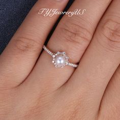 Pearl engagement ring Rose gold Pink Akoya Pearl Ring Women Natural diamond halo wedding ring June birthstone Half eternity cluster vintage ✨ This listing sells the main ring only - other jewelry pieces shown in the pictures are for reference only. Click it to get the bridal set: https://www.etsy.com/listing/1033341113 https://www.etsy.com/listing/1030291721 Items Description: Engagement Ring: * Center stone: Natural Akoya Pearl, 5MM, Round Cut * Accents: Natural Diamonds, VS clarity, G color, 0 Dainty Round Halo Setting Wedding Ring, Diamond Pearl Ring With Halo For Wedding, Round Cut Pearl Ring With Halo Setting For Wedding, Diamond Halo Pearl Ring For Wedding, Pearl Promise Ring With Halo Setting, Round Cut Halo Setting Pearl Wedding Ring, Wedding Pearl Ring With Diamond Halo, Anniversary Pearl Ring With Halo Setting, Anniversary Pearl Ring With Halo Setting And Cubic Zirconia