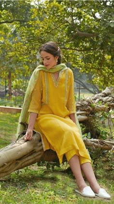 Yellow Dress For Wedding Guest, Yellow Lawn Suit For Navratri, Festive Lawn Suit With Embroidered Border In Cotton Silk, Festive Cotton Silk Lawn Suit With Embroidered Border, Spring Embroidered Mulmul Salwar Kameez, Diwali Lawn Suit With Embroidered Border, Straight Kurta Sets In Mulmul With Embroidered Border, Yellow Anarkali Kurta For Spring, Navratri Lawn Suit With Embroidered Border Straight Kurta