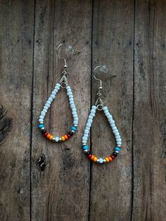 -Lightweight dangle earrings -Made with mini sized seed beads -Sterling silver hooks -Comes with clear backs Mini Bead Earrings, Tiny Beaded Earrings, Western Beaded Earrings, Western Sunrise, Bead Edging, Beaded Projects, Beaded Jewelry Earrings, Homemade Earrings, Bracelet Craft