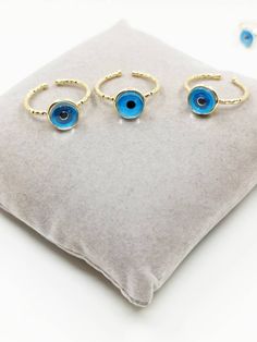 🧿Evil Eye Ring is adjustable so it comfortably fits on any finger. 🧿Evil Eye Dainty Ring is gold and stainless steel. This Turkish Jewelry would be a great gift for someone special. For more evil eye rings, click the link below; https://www.etsy.com/shop/EyeDesignsbyGG?ref=search_shop_redirect&section_id=30300373 Adjustable Blue Open Ring Jewelry, Blue Metal Rings As A Gift, Blue Metal Ring As Gift, Adjustable Metal Midi Rings As Gift, Adjustable Metal Midi Rings For Gifts, Adjustable Metal Midi Rings Gift, Adjustable Evil Eye Ring Jewelry, Adjustable Evil Eye Open Ring Jewelry, Adjustable Open Ring With Evil Eye