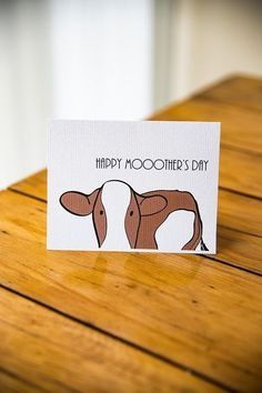 a card that says happy mother's day with a brown cow on the front