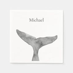 a black and white photo of a whale's tail with the word michael on it