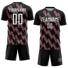 a soccer jersey with the name teamname 00 printed in pink and black on it