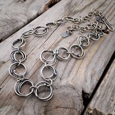 "Sterling Silver Handmade Chain Necklace Handmade Sterling Silver Chain Wild Prairie Silver This chain is adjustable 16-22\". If you would like a longer chain please message me. This chain is completely handmade Your choice of shiny or oxidized Handmade with love in rural Wisconsin by Wild Prairie Silver Follow Us: Instagram: https://www.instagram.com/wildprairiesilver/ Facebook: https://www.facebook.com/wildprairiesilver/ Visit our Jewelry Website www.wildprairiesilver.com Handmade Jewelry Supp Huge Necklace, Handmade Chain, Jewelry Diy Bracelets, Jewelry Website, Silver Earrings Handmade, Sterling Silver Jewelry Handmade, Silver Jewelry Handmade, Sterling Silver Cross, Artistic Jewelry