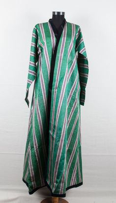 Vintage Uzbek silk and cotton coat 5'4''x by SOrugsandtextiles Silk Long Sleeve Kaftan For Formal Occasions, Formal Long Sleeve Silk Kaftan, Ceremonial Long Sleeve Outerwear For Fall, Bohemian Long Sleeve Abaya For Ceremonial Occasions, Fitted Long Sleeve Kaftan For Ceremonial Occasions, Traditional Green Outerwear With Stand Collar, Bohemian Long Sleeve Thobe For Ceremonial Occasions, Traditional Green Long Sleeve Outerwear, Bohemian Long Sleeve Ceremonial Abaya