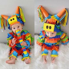 two babies dressed up in colorful costumes