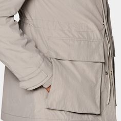 It's the best of both worlds-this light taupe lightweight field jacket brings plenty of styling versatility and functional details like a double zip closure, flapped patch pockets and interior cinching drawstring. Long Sleeve Khaki Outerwear With Functional Pockets, Khaki Long Sleeve Outerwear With Functional Pockets, Khaki Long Sleeve Outerwear With Pockets, Utility Parka With Multiple Pockets, Utility Outerwear With Functional Pockets For Spring, Beige Winter Outerwear With Cargo Pockets, Beige Utility Outerwear With Side Pockets, Utility Beige Outerwear With Side Pockets, Beige Outerwear With Multiple Pockets For Outdoor