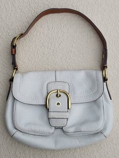 Beautiful White Leather Vintage COACH Shoulder Bag!! Are you tired of your old purse? Do you like quality leather that last forever? Then this COACH purse is for you.  -High quality leather -Well known brand -Elegant & Classy And... We also offer fast and free shipping! Condition is Pre-owned, good with light wear! Cheap Vintage White Shoulder Bag, Luxury Elegant Coach Bags, Luxury Formal Coach Bag, Luxury Textured Leather Coach Bags, Luxury Silver Coach Bag, Luxury Modern Coach Bags, Elegant Luxury Coach Shoulder Bag, Luxury Coach Coated Canvas Shoulder Bag, Luxury Vintage Coach Satchel