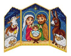 a cross stitch nativity scene with the birth of jesus and three wise men,