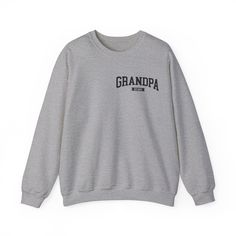 New Grandpa est Sweatshirt, Custom Father Day Sweatshirt, Custom Fathers day Gift, Custom Grandpa Sweatshirt, Grandpa Gift, Dad shirt, Crewneck Sweatshirt Father day 💫Ideal for any situation, a unisex heavy blend crewneck sweatshirt is pure comfort. 💫 Made with a medium-heavy fabric blend of 50% cotton and 50% polyester, this sweatshirt feels cozy and is the perfect choice for those colder months. 💫 Made using 100% ethically grown US cotton. Gildan is also a proud member of the US Cotton Trus Gray Crew Neck Sweater With Pockets, Gray Letter Print Crew Neck Sweatshirt, Gray Crew Neck Top With Letter Print, Casual Crew Sweatshirt With Name Print, Casual Crew Neck Sweater With Name Print, Heather Grey Long Sleeve T-shirt With Letter Print, White Crew Neck Sweatshirt With Pockets, Gray Crew Neck Sweater With Letter Print, Gray Letter Print Sweatshirt For Everyday