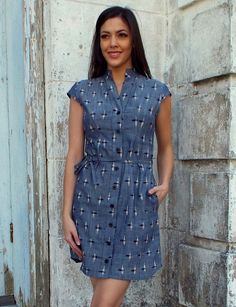 Passion Lilie fair trade 100% cotton grey button up t-shirt like chambray ikat dress with a stand up collar, cap sleeves, optional fabric belt, and side pockets. Designed in New Orleans. Handwoven and ikat dyed in India. Lovely Grey, Cotton Short Dresses, Ikat Dress, Fair Trade Clothing, Ankara Dresses, Chambray Fabric, Organic Cotton Dress, Mod Style, Capped Sleeves