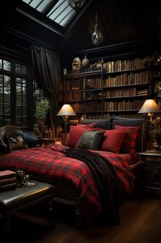 a bed with red and black plaid comforter in a room filled with bookshelves