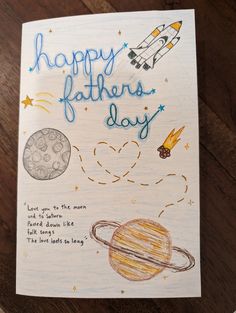 a handmade father's day card with space and rockets