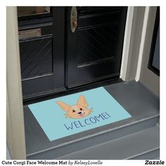 a welcome mat with a dog on it in front of a door that says welcome