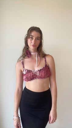 Pink Floral Luxury Summer Bralette, High End Boudoir Lingerie, Ballet Core Top This delicate chiffon crop is handmade from 100% repurposed fabric Gathered ruching over bust, with elastic edges for extra support Detailed elastic trim straps Design is Size 2. Adjustable back tie and gathered design allows design to be worn as Size 1 or Size 3. DETAILS Comfortably ruched sleep top in japanese inspired floral print Light weight and delicate chiffon fabric Elasticated at top and bottom hemlines Ruched design over front and back bust Elastic straps Rolled edge hemlines This item is the top only Check out the matching Full Mini Skirt for a full cohesive look Top is made from limited quantity repurposed fabric. Only one of a kind available and once sold out style cannot be recreated due to fabric Crop Top Outfits Summer, Repurposed Fabric, Crop Top Summer, Summer Crop Top, Luxury Honeymoon, Honeymoon Lingerie, Ballet Core, Feminine Top, Wear Crop Top