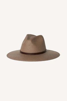 A best-selling packable straw hat. judith is finished with a rich brown regenerative leather strap and a statement knot detail on the back. this effortless piece can easily be worn year-round and is meant for traveling with you wherever you go.    details:    - 100% straw with regenerative leather band  - made in usa  - upf 35+  -   brim: 3.75" crown: 5"    photos from janessaleone.com    55 cm - small  57.5 cm - medium  59 cm - large  60 cm - extra large    about the brand:    janessa leoné was born and raised in southern california and launched her eponymous line of wool hats in 2013. the brand has since expanded into an internationally recognized lifestyle label with a flagship boutique in los angeles california.  with a focus on high-quality essentials and a commitment to sustainable p Beach Fedora In Natural Color With Upf 50+, Natural Fedora With Upf 50+ And Curved Brim, Wide Brim Natural Fedora With Upf 50+, Beige Fedora With Upf 50+ And Wide Brim, Janessa Leone Hat, Women Fedora, Contemporary Clothes, Wool Hats, Janessa Leone