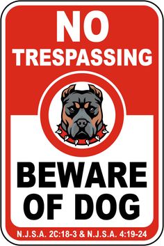 a sign that says no trespassing beware of dog with an image of a dog