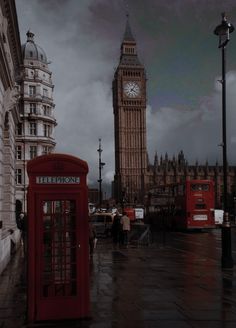 the big ben clock tower towering over the city of london on a rainy day in england