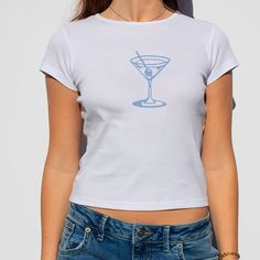 Martini Baby Tee 🍸🎀 Perfect for your summer wardrobe  Thank you for shopping at By Basha!! If you choose to purchase something your order is greatly appreciated 💖 D E S C R I P T I O N  ✸ made with 100% cotton (micro) ribbed baby tee ✸ classic baby tee fit �✸ crew neckline ✸ made in the U.S. S I Z I N G  Since every body is different, please use the size guide to determine which size is best for you.  These are women's baby tees and run true to size. If you're unsure what size to get take a lo Baby Tee Sayings, Light Pink Baby Tee, Romantic Blue Baby Tees, Martini Graphic, Pacsun Baby Tee, Y2k Shirts Baby Tees, I'm Just A Girl, Baby Tees, P T