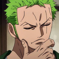 an anime character with green hair holding his hand to his face