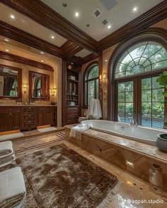 a large bathroom with an enormous tub and windows